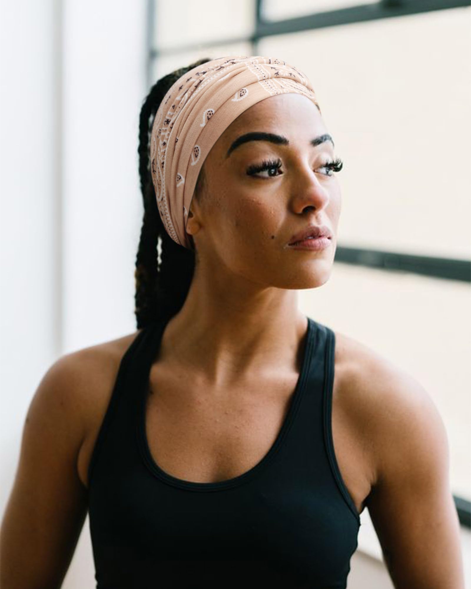 AQOKKA headband beside ruler showing width and stretch for full forehead coverage