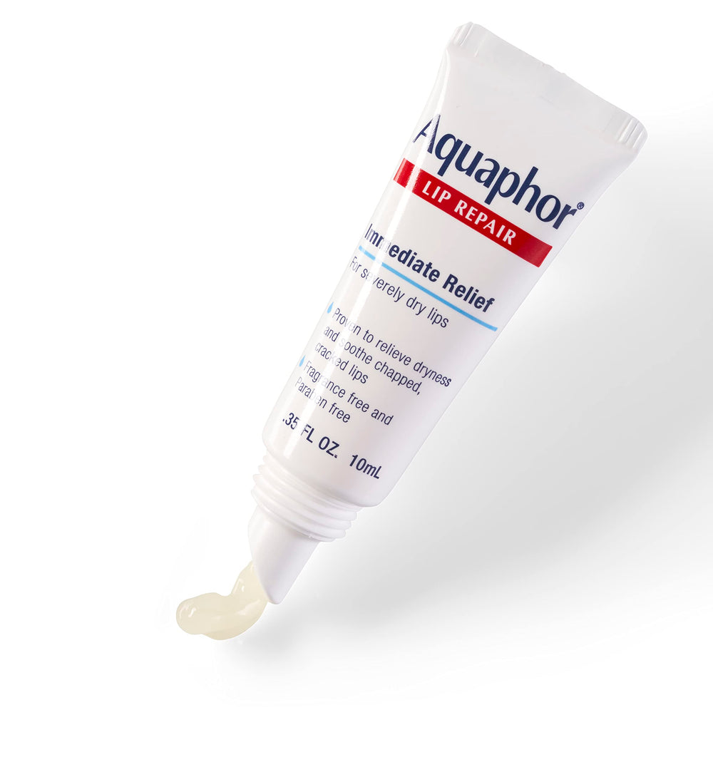 Aquaphor lip repair tube on nightstand illustrating overnight repair convenience