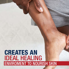 Aquaphor jar beside socks for nighttime occlusion and enhanced treatment benefit