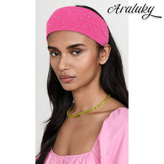 Araluky headband held in hand for scale showing compact, travel-friendly size