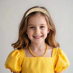 ARBEYOOU child wearing a headband outdoors, comfortable fit and eye-catching sparkle