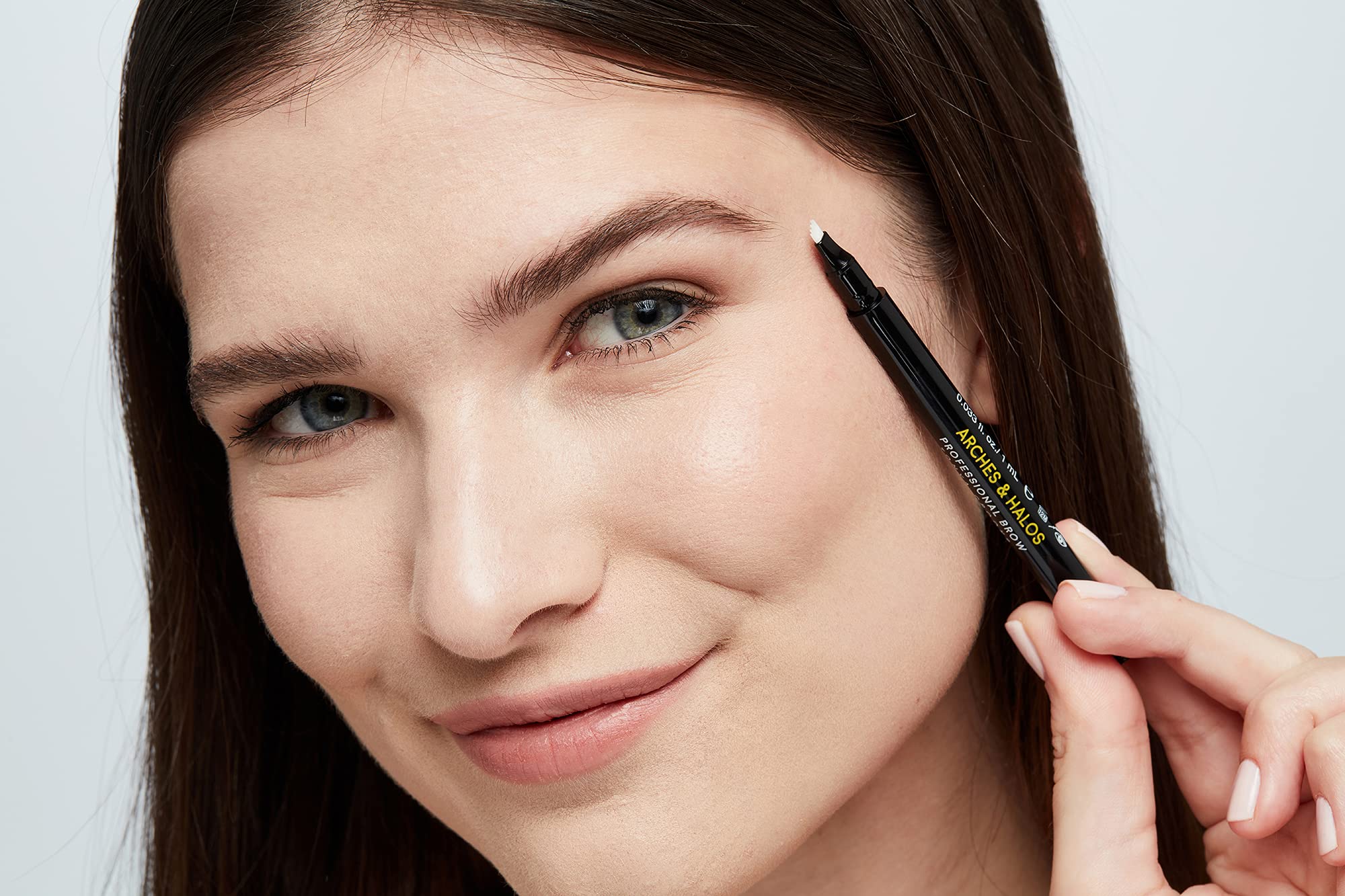 Arches & Halos pen in use drawing feathered strokes for natural brows