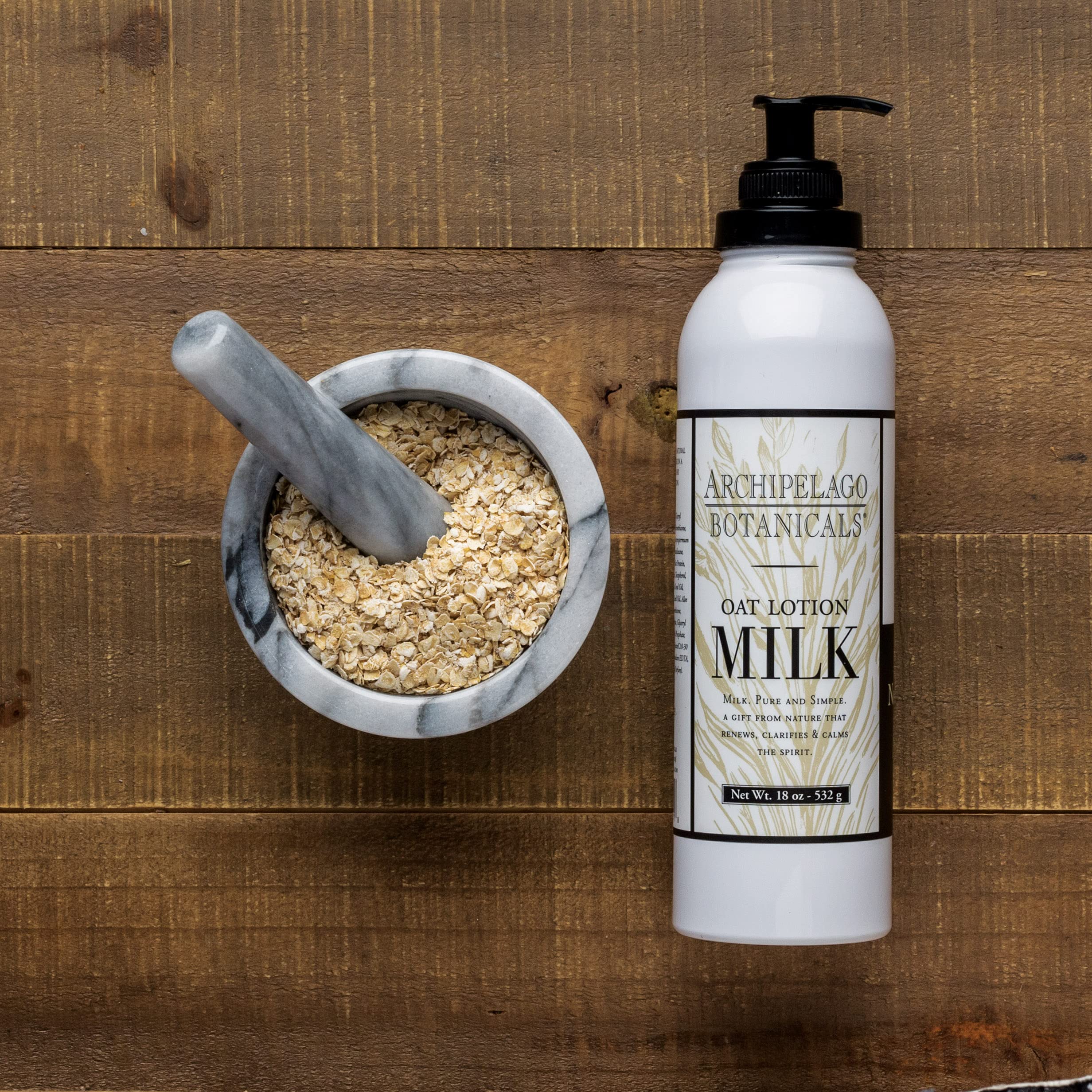 Archipelago Botanicals lotion applied to hand demonstrating immediate hydration benefit