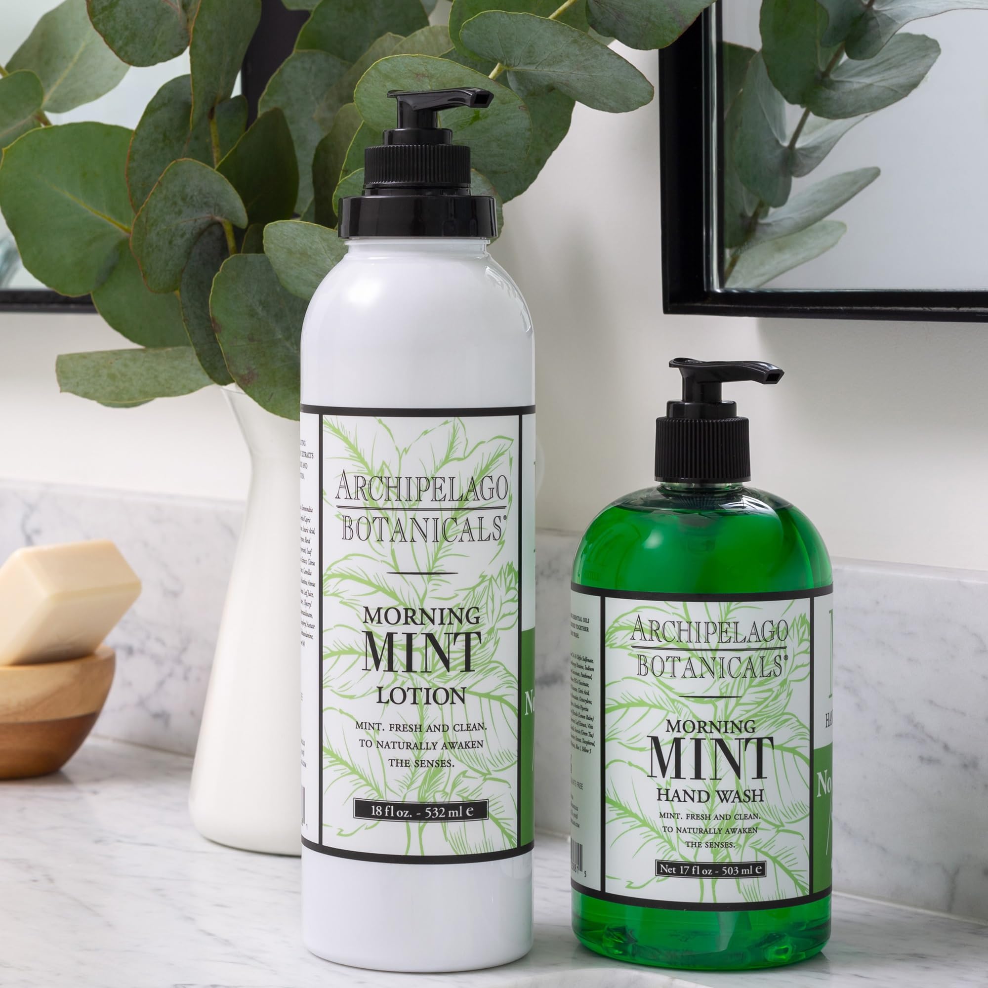 Archipelago Botanicals next to a water bottle showing 18 oz size convenience benefit