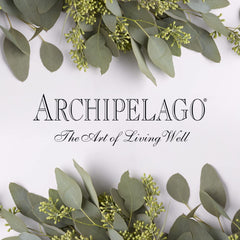 Archipelago Botanicals bottle lit from side emphasizing color and premium packaging quality