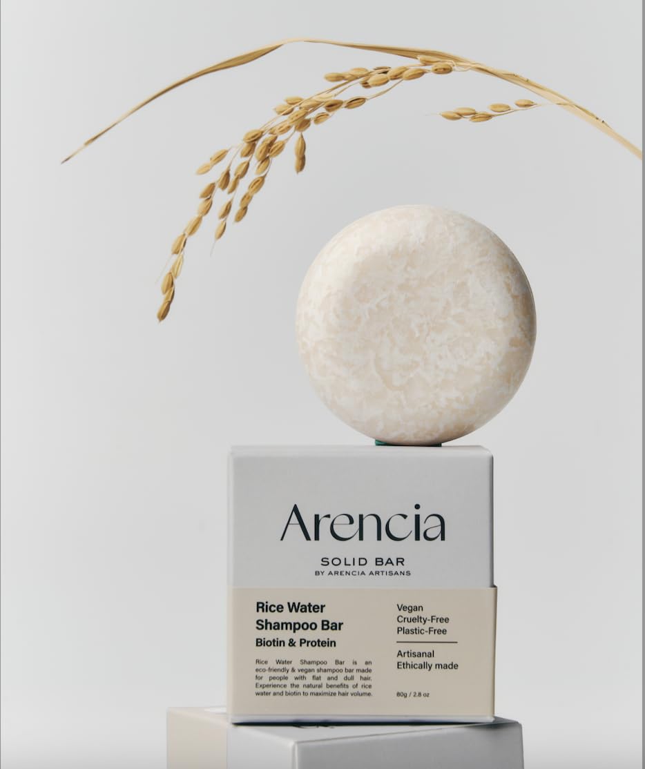 ARENCIA shampoo bar in shower scene promoting sustainable routine