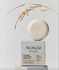 ARENCIA shampoo bar in shower scene promoting sustainable routine