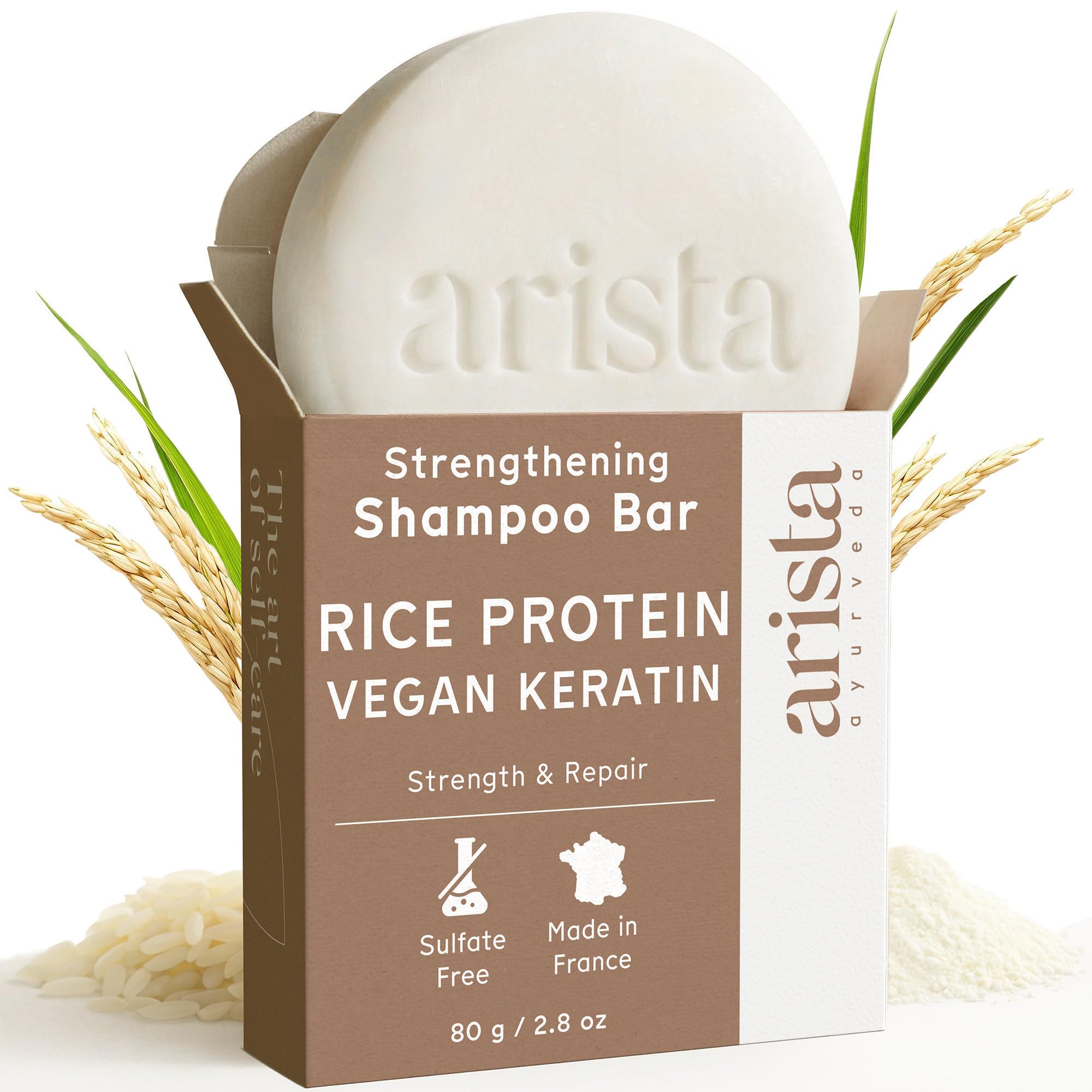 Arista shampoo bar front view showing the compact, eco-friendly bar and clear label