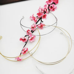 ArrErr headband used in a feather fascinator demonstrating finished look and wearable style
