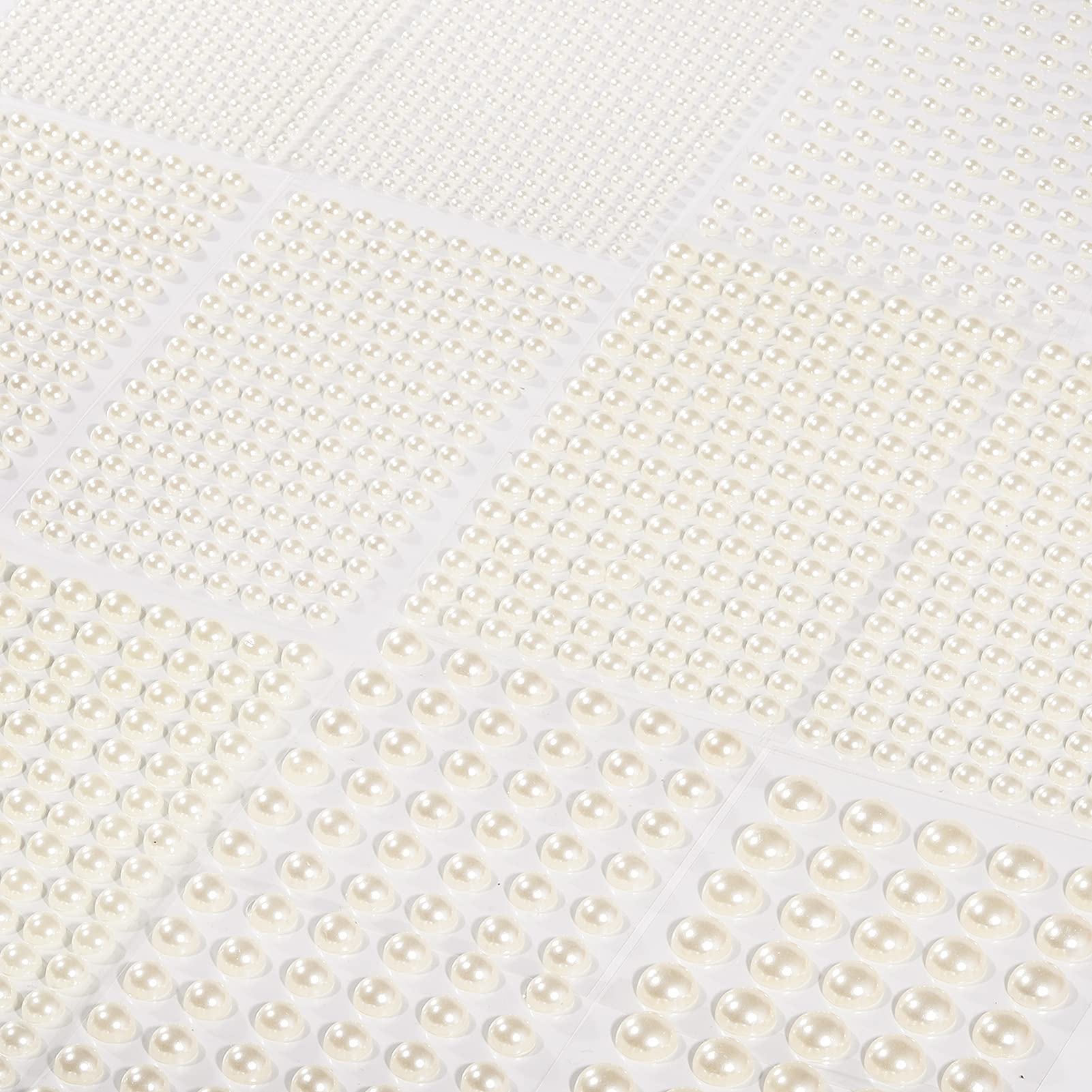 Artistbeauty pearls on wedding invitation showing elegant craft enhancement