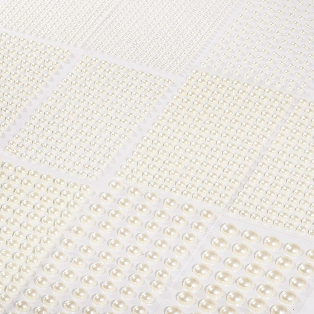 Artistbeauty pearls on wedding invitation showing elegant craft enhancement