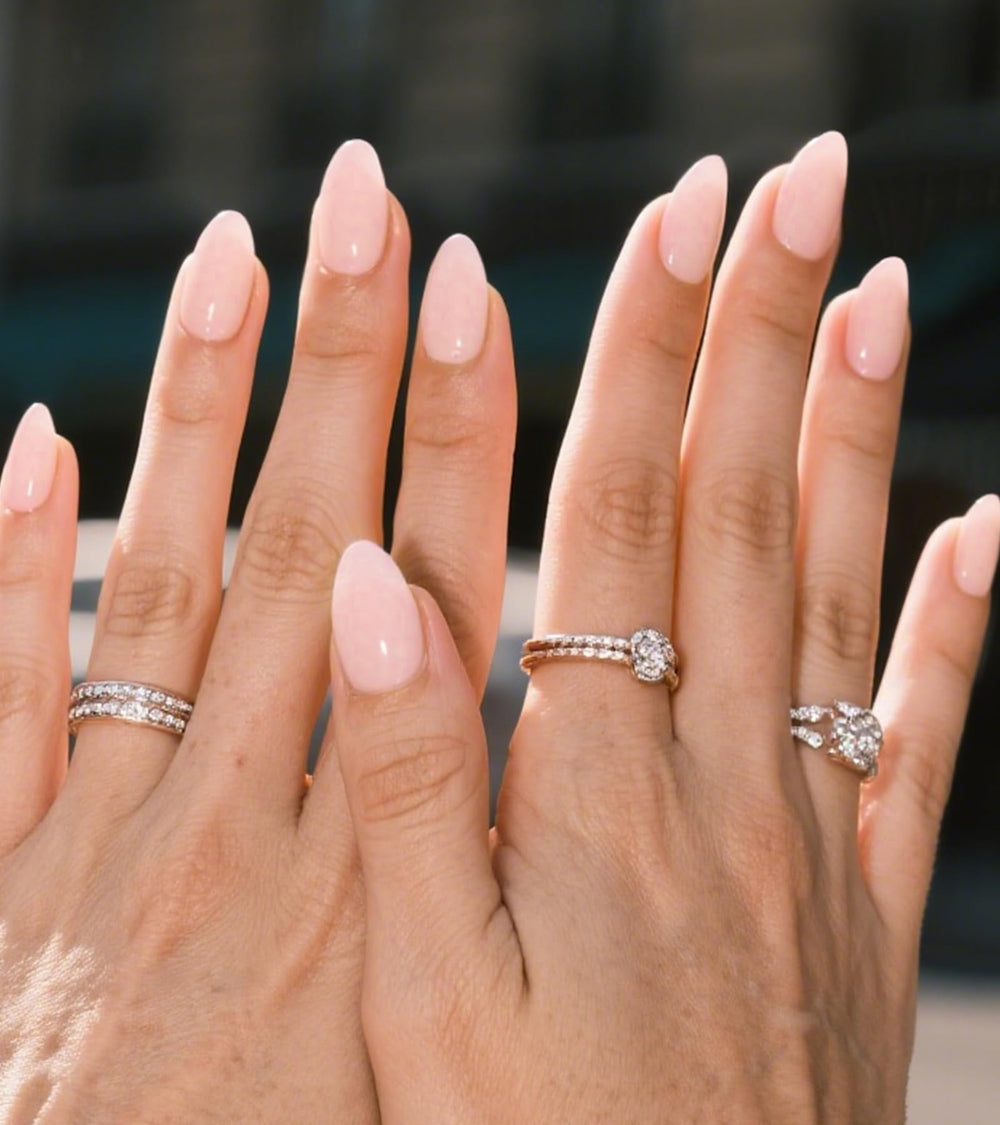 Artquee close-up of glossy soft pink almond tip showing durable high-shine finish
