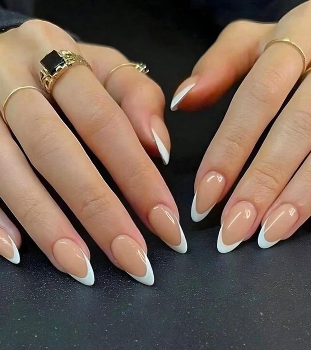 Artquee close-up of glossy white French tip highlighting clean finish
