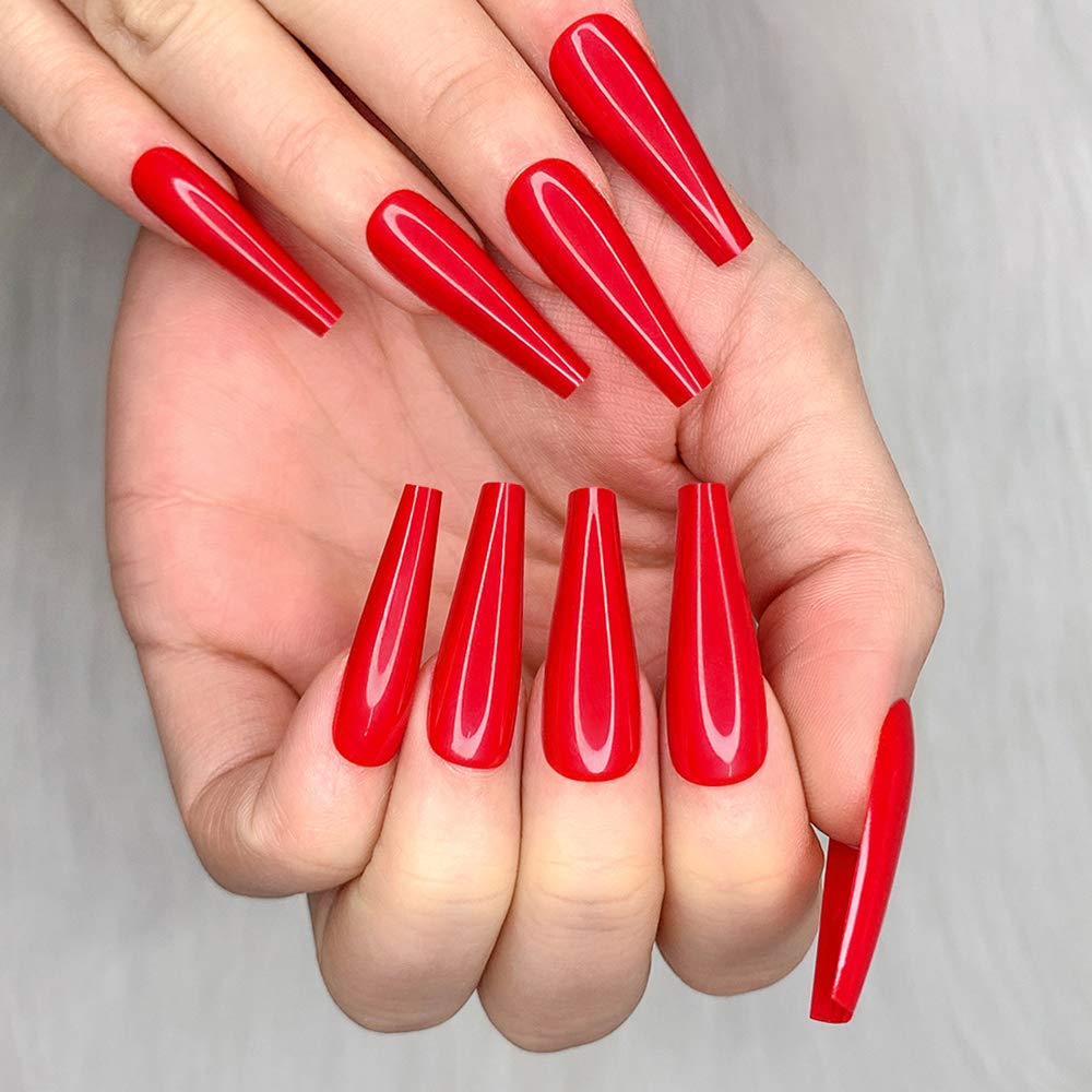 Artquee close-up of glossy red surface highlighting durable shine and salon look