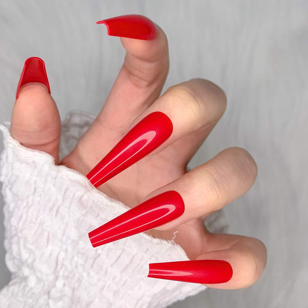 Artquee worn on hands lifestyle shot demonstrating elegant long coffin manicure
