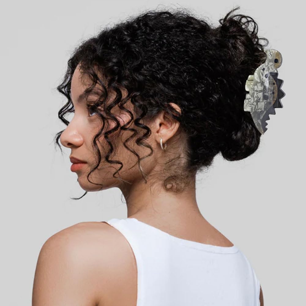 Arvintas clip securing a thick bun, shows strong grip and scale