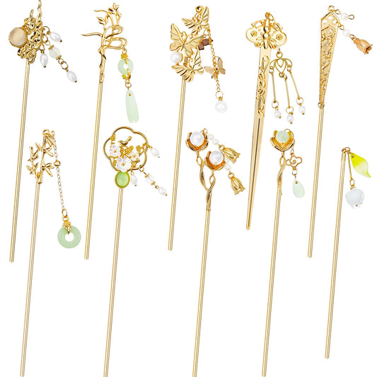 Arvintas front view of gold hair sticks showing ten varied pendants and vintage look