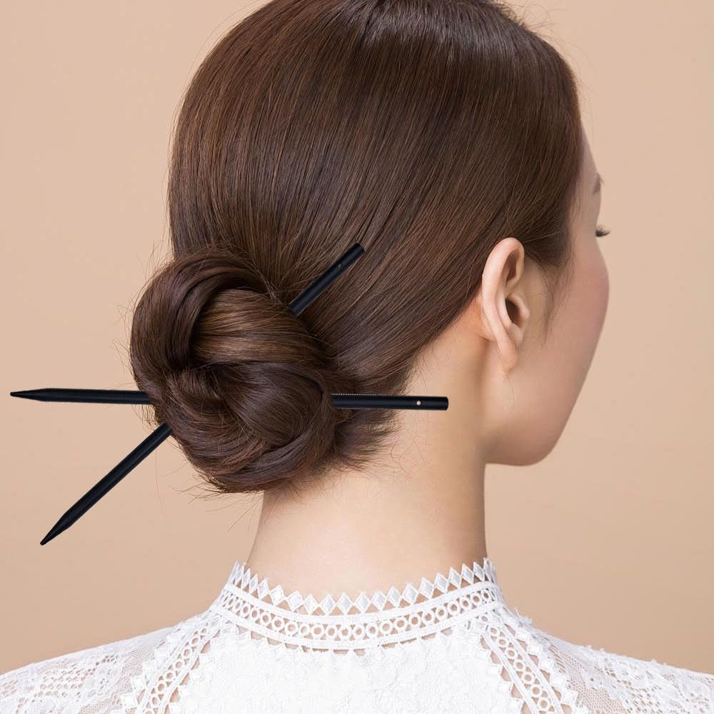 arvintas hair stick securing a bun illustrating reliable hold and elegant look