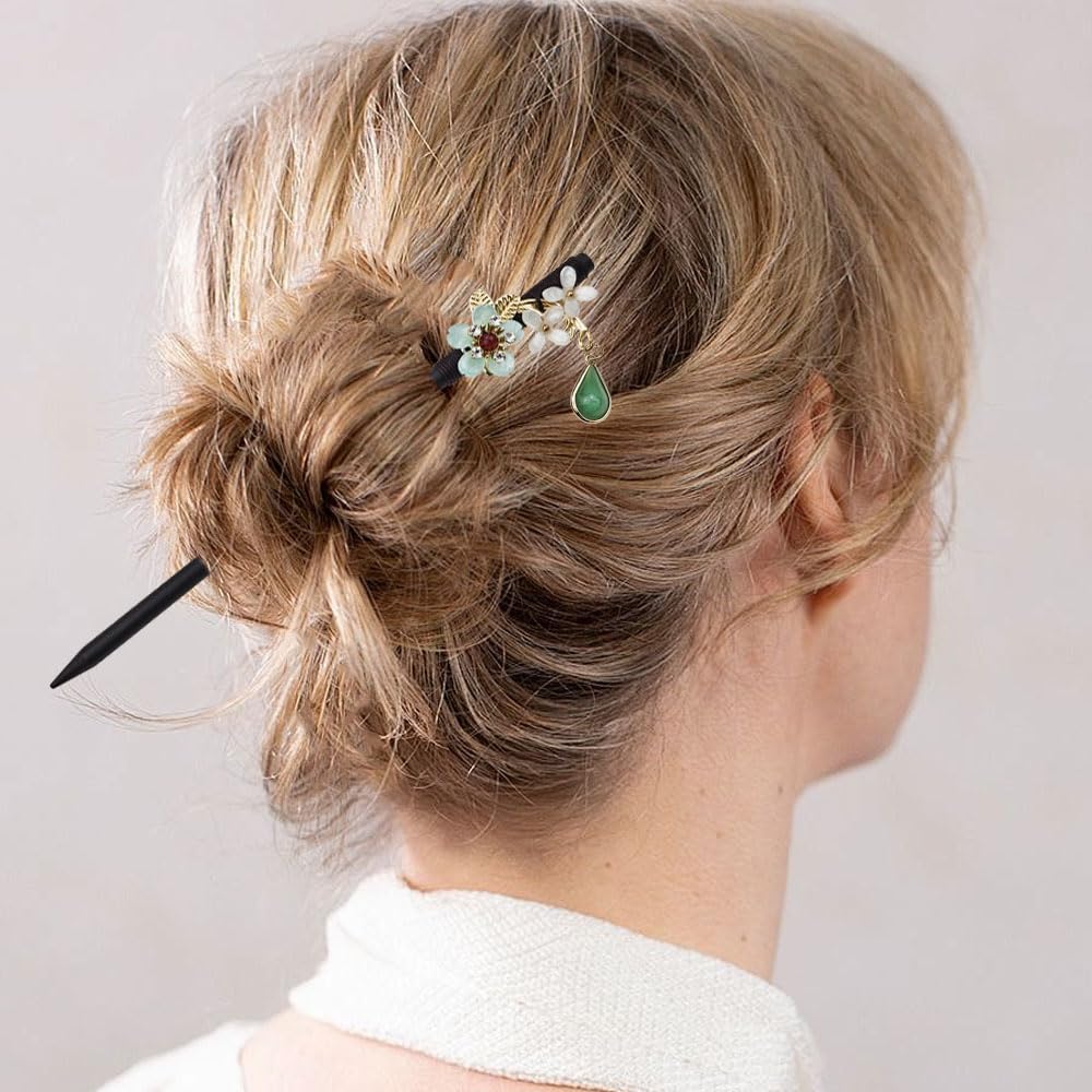 Arvintas hair stick next to a ruler showing length for versatile updos and stable support