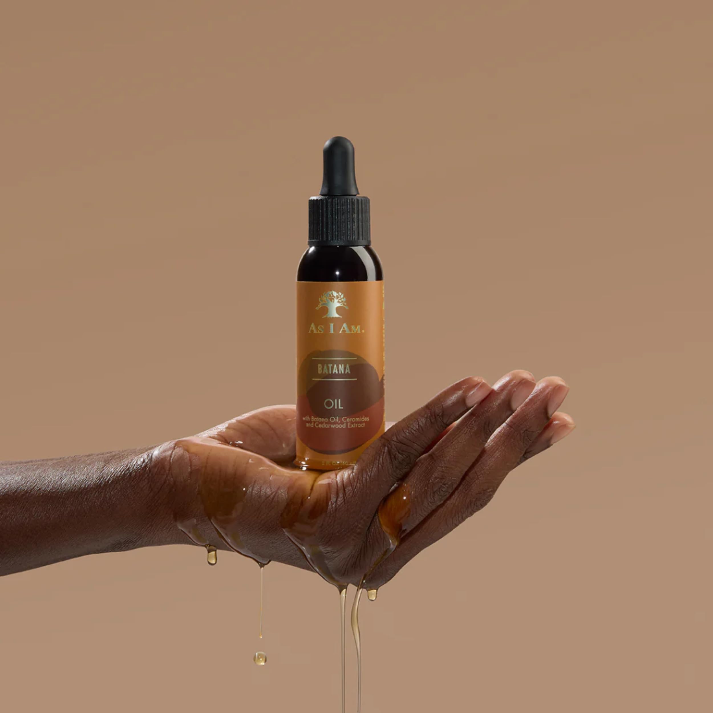 As I Am oil texture close-up demonstrating lightweight absorption and shine