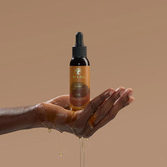As I Am oil texture close-up demonstrating lightweight absorption and shine