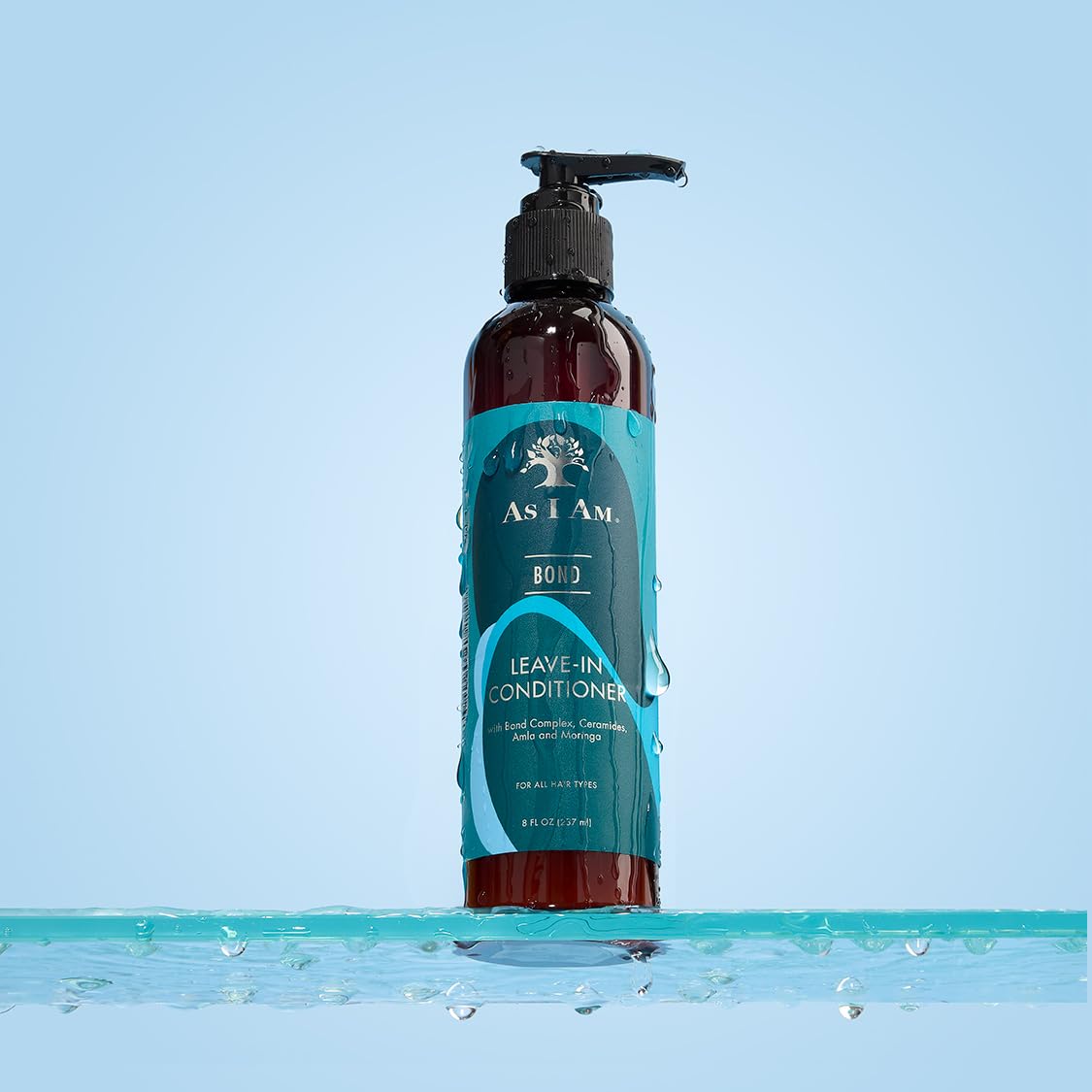 As I Am bottle in hand showing 8 oz size for regular use convenience