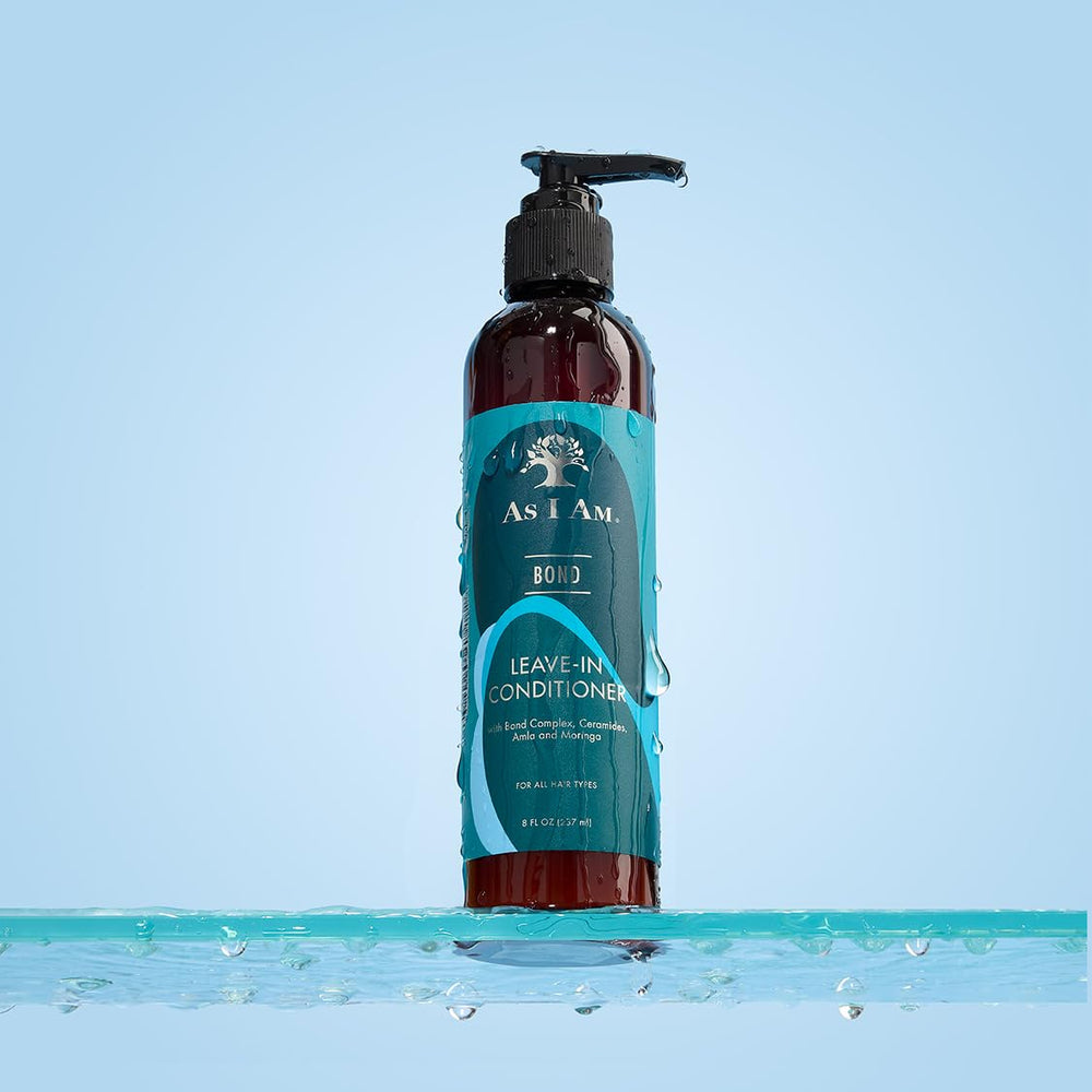 As I Am bottle in hand showing 8 oz size for regular use convenience