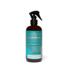 As I Am Bond Water used on braids reducing dryness and protecting edges