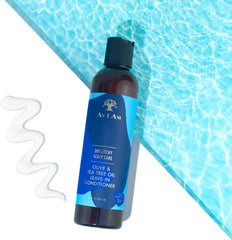 As I Am applied to wet curly hair demonstrating detangling and scalp comfort