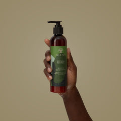 As I Am bottle on bathroom shelf suggesting daily use and routine integration