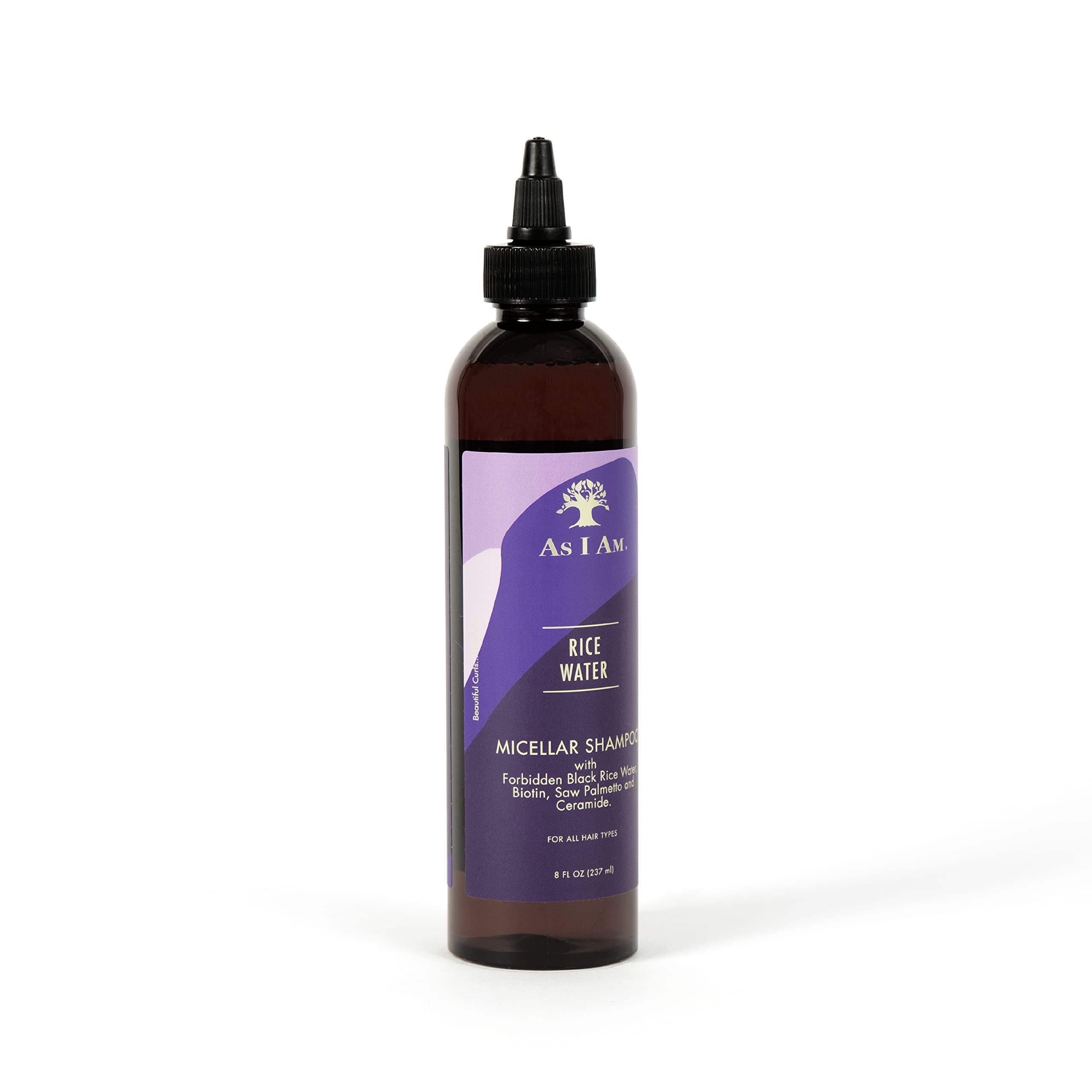 As I Am shampoo pump in hand showing easy dispensing and convenient use