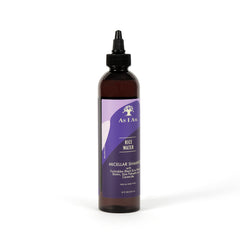 As I Am shampoo pump in hand showing easy dispensing and convenient use