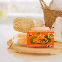 ASANTEE ingredients display of papaya and honey highlighting natural actives