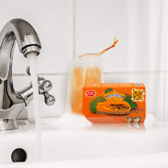 ASANTEE soap rich foam in hand demonstrating gentle cleansing