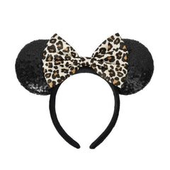 ASHONE leopard headband front view showing ears and shiny bow, perfect for parties