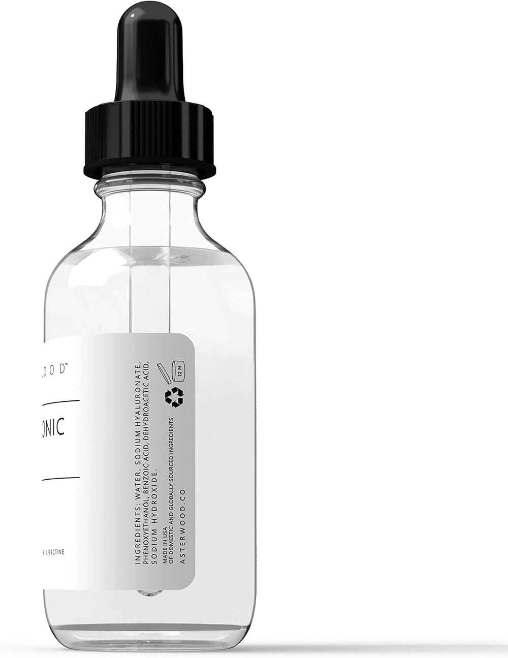 Asterwood bottle beside night cream on bedside table for routine pairing