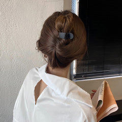 Aswewamt clip gripping ponytail illustrating strong non-slip hold