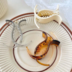 aswewamt clip holding a bun for secure all-day comfort