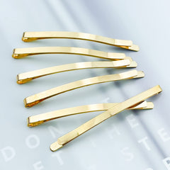 Aswewamt bobby pins beside ruler showing exact 65mm length advantage