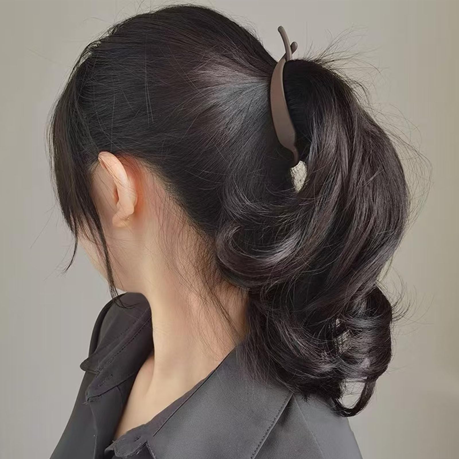 Aswewamt clip in hair demonstrating a French twist and comfortable wear