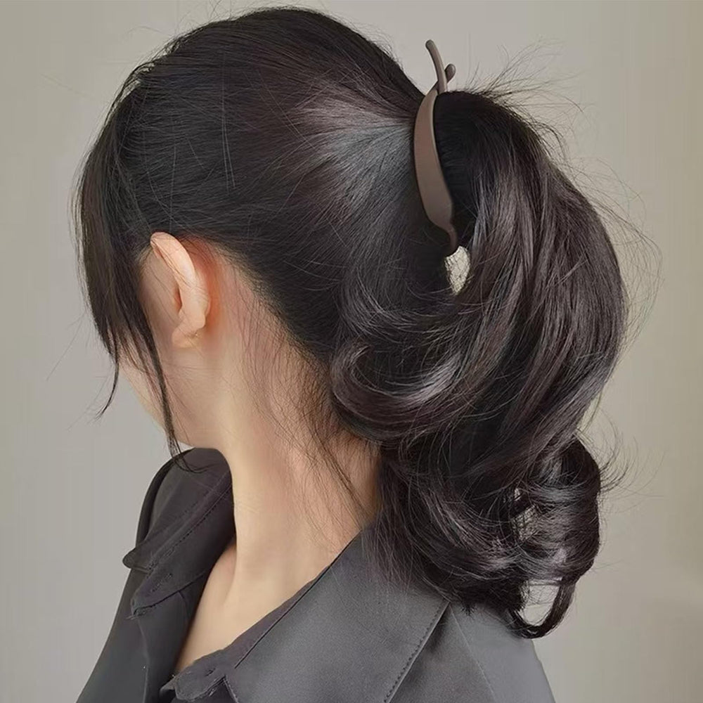 Aswewamt clip in hair demonstrating a French twist and comfortable wear