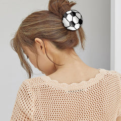 Aswewamt clip worn in half-up hairstyle offering tidy look and sport flair