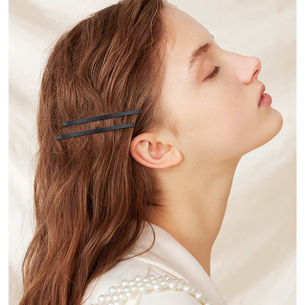 Aswewamt pins securing an elegant updo, keeps style in place
