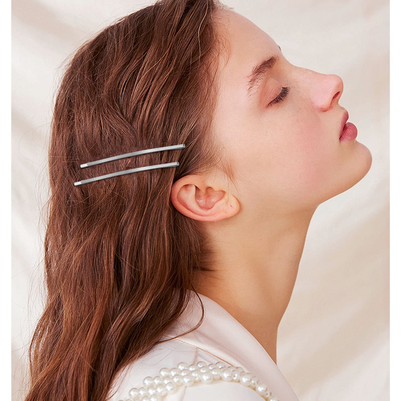 Aswewamt pin securing a bun to demonstrate strong hold and styling support