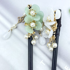 Aswewamt model wearing hairstick in updo showing elegant retro look