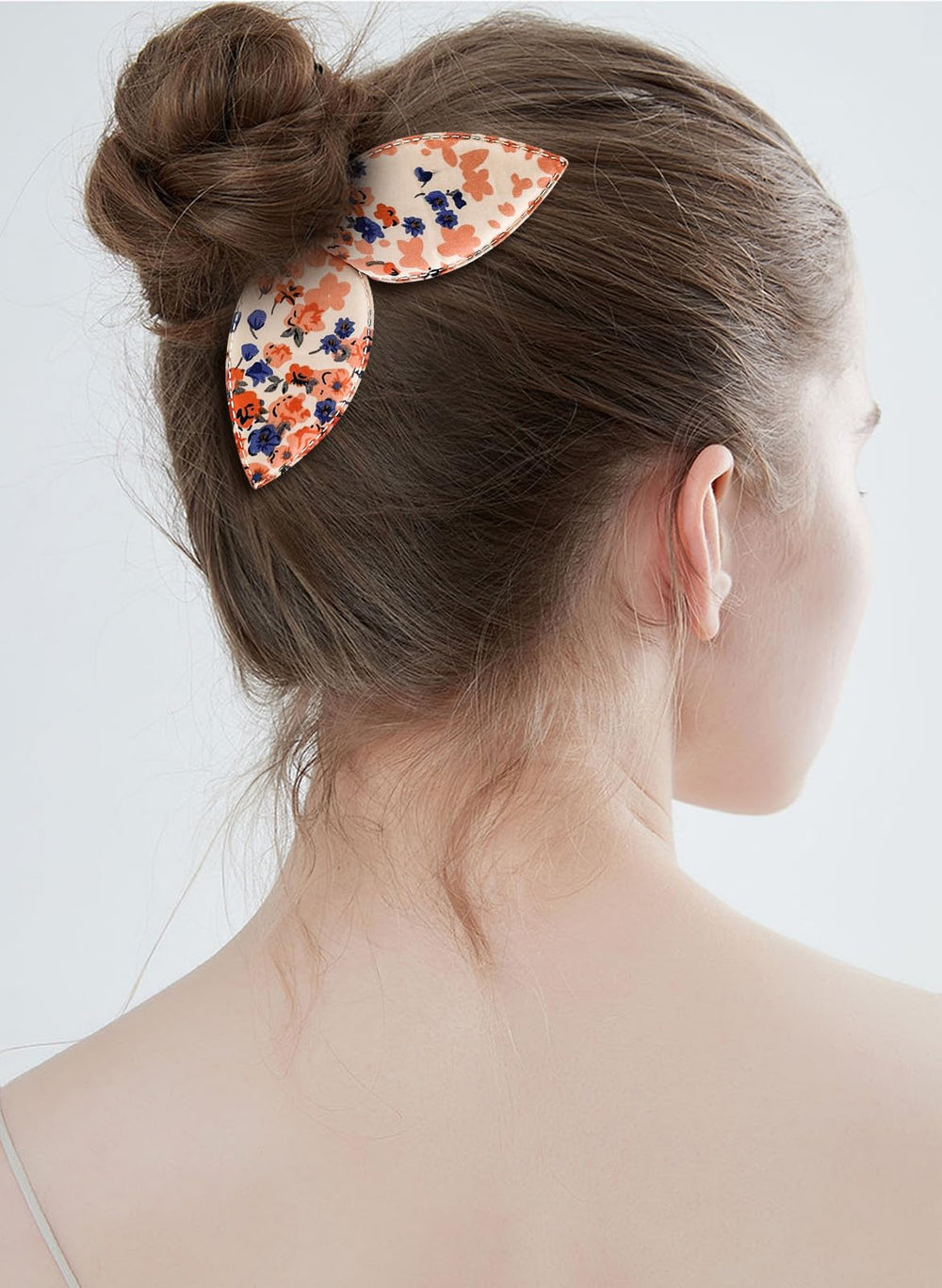 Aswewamt worn as a messy bun during outing, durable hold benefit