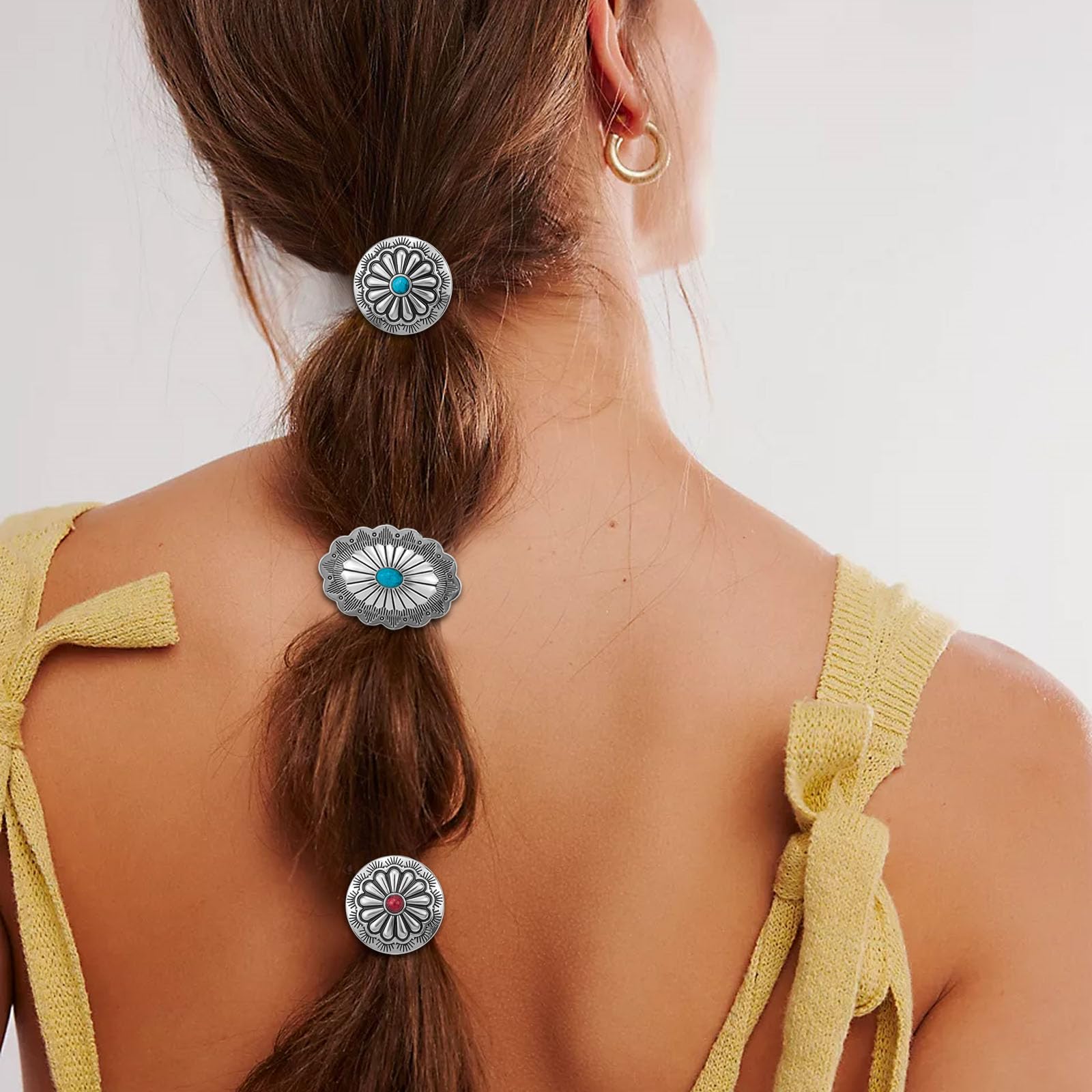 Aswewamt ponytail styled in dark hair showing secure hold and decorative finish