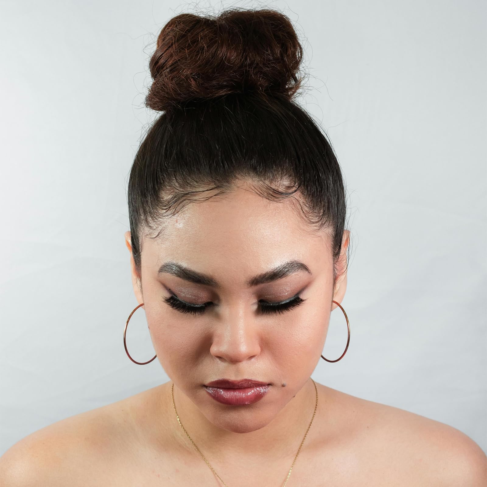 aswewamt styled ballet bun in lifestyle scene for polished look