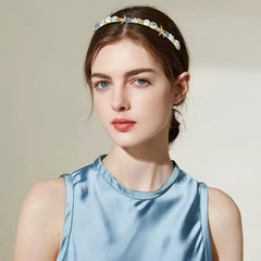 Aswewamt model wearing headband on beach showcasing photogenic bridal or vacation look