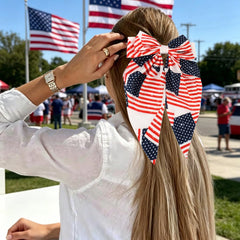 Atoden bow styled in ponytail showing festive look and comfortable all-day wear